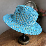 Load image into Gallery viewer, Fresh grass green hand-woven top hat women's summer vacation wind hollow straw hat wide edge sun hat beach sun protection hat