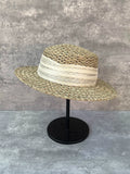 Load image into Gallery viewer, Blogger with the same silk and linen decoration French seaside vacation straw hat women's summer salty straw woven hollow flat top sunshade hat
