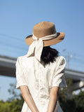Load image into Gallery viewer, Hepburn style French bow straw hat women's travel big eaves hat summer outdoor top hat elegant seaside sun hat