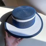 Load image into Gallery viewer, Straw hat women's summer big eaves beach seaside shade navy blue color matching flat top sun hat British versatile top hat