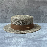 Load image into Gallery viewer, French retro salty grass hollow sun hat men and women seaside vacation travel beach flat top hat elegant straw hat
