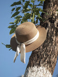 Load image into Gallery viewer, Hepburn style French bow straw hat women's travel big eaves hat summer outdoor top hat elegant seaside sun hat