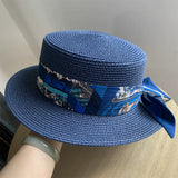 Load image into Gallery viewer, Korean version navy blue elegant straw hat flat top hat wide brim straw woven top hat women's summer hat sun protection UV protection travel