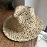 Load image into Gallery viewer, Fresh grass green hand-woven top hat women's summer vacation wind hollow straw hat wide edge sun hat beach sun protection hat