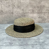 Load image into Gallery viewer, Blogger with the same silk and linen decoration French seaside vacation straw hat women's summer salty straw woven hollow flat top sunshade hat