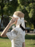 Load image into Gallery viewer, Hepburn style French bow straw hat women's travel big eaves hat summer outdoor top hat elegant seaside sun hat