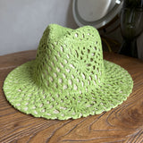 Load image into Gallery viewer, Fresh grass green hand-woven top hat women's summer vacation wind hollow straw hat wide edge sun hat beach sun protection hat