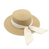 Load image into Gallery viewer, Hepburn style French bow straw hat women's travel big eaves hat summer outdoor top hat elegant seaside sun hat