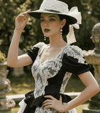 Load image into Gallery viewer, icevellyyy black and white Victorian lace dress with puff sleeves, ruffled hem, and ornate detailing.