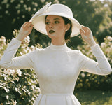 Load image into Gallery viewer, icevellyyy elegant white long-sleeved satin dress with high neck, lace bodice, pearl buttons, and bow hat.