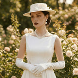 Load image into Gallery viewer, icevellyyy white vintage-inspired fascinator hat with floral embellishment and veil, perfect for formal occasions.